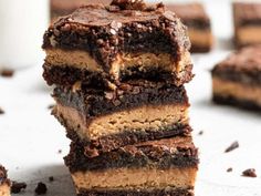 chocolate and peanut butter brownies stacked on top of each other