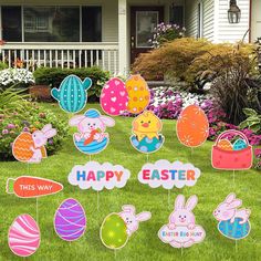 an assortment of easter decorations in the grass