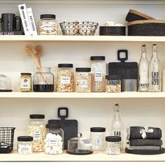 shelves filled with jars, containers and other items