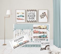 a baby crib bedding set with cars and race cars on the wall next to it