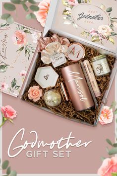 the godmoter gift set is in a box with pink flowers and greenery