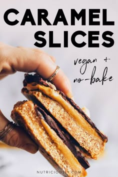 a hand holding a peanut butter and chocolate sandwich with the words, caramel slices vegan + no - bake