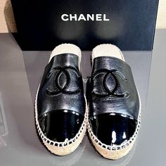 Pristine Brand In Original Box With Dust Bag 100% Authentic Pristine Condition!!! Worn 2 Times!!! Chanel Goatskin Patent Cc Espadrille Mules These Lovely Espadrille Shoes Are Crafted Of Soft Goatskin Leather In Black With A Black Patent Chanel Cc Patch And A Black Patent Cap Toe. These Are Ideal For A Timeless Accent To Casual Wear, From Chanel! Available In Size 41 Beautiful, Sophisticated And Comfortable !!! A Simply Must Have!!! Guaranteed To Be 100% Authentic We Have Orginial Purchase Receipt. Purchased May 2018, From Neiman Marcus, Short Hills Mall Nj Includes Orginal Chanel Box And Dust Bag. Short Hills, Espadrilles Slides, Purchase Receipt, Chanel Box, Mule Flat, Chanel Black, Espadrille Shoes, Chanel Shoes, Mule