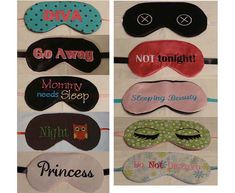 several different types of sleep masks with names on them, all lined up in rows