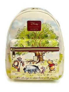 Disney Loungefly Winnie the Pooh & Friends Mini Backpack Eeyore Tigger Book Bag Ready to go exploring in the Hundred Acre Wood? Carry all of your things in this mini backpack from Winnie the Pooh. The front features a sketch-inspired image of Pooh, Piglet, Eeyore and Tigger with "It's always an adventure with you..." text design. Adjustable straps, front zipper pocket and interior drop pocket. 8" x 4 1/2" x 10" Polyurethane Ajustable Straps Front Zipper Pocket Interior Drop Pocket Whinnie The Pooh Basket, Winnie The Pooh Handbag, Disney Travel Backpack, Disney Style Backpack For Travel, Loungefly Winnie The Pooh, Disneyland Backpack, Loungefly Purse, Disney Bags Backpacks, Piglet Eeyore