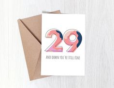 a card with the number twenty nine and it says 29 and damn you're still fine