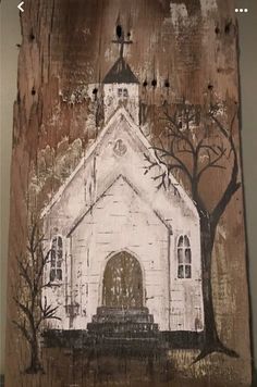 an old church with trees painted on it