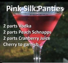 a pink drink in a wine glass with the words pink silk panties written below it