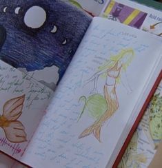 an open children's book with drawings on it