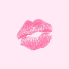 two pink lips are shown against a white background