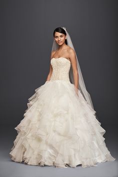 a woman in a wedding dress with the words special value olege cassni strapless ru