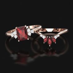 two red and white diamond rings on black background