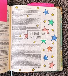 an open bible with colorful stars on it and the words, this love has no limit