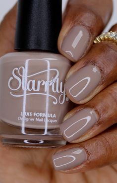 Starrily Lone Wolf Nail Polish: Overview:• Taupe crème nail polish• Best applied in 2-3 coats Description: "Lone Wolf" symbolizes the profound beauty of carving one's unique trail through life, unburdened by the expectations of the pack. The taupe shade echoes the rugged beauty of a wolf's fur, and the quiet strength it exudes while traversing the wilderness alone. This shade is for the individuals who find their greatest strengths when they stand alone, and it embodies the unyielding spirit of those who choose the path less traveled. ★ Certified vegan & cruelty-free nail polish★ Made in the USA. 15 ml / 0.5 fl oz Tip: Always start with a base coat and finish with a clear topcoat. Taupe Nail Colors Shades, Gray Brown Nail Polish, Mauve Marble Nails, Grey Brown Nails, Taupe Nail Color, Taupe Manicure, Taupe Nail Polish, Taupe Nails, Brown Nail Polish