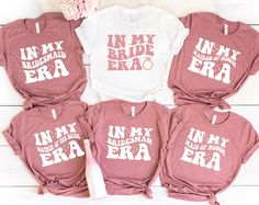 six t - shirts with the words in my bridal era printed on them, sitting next to a flower