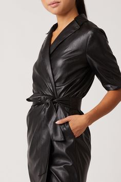 Our Robin Vegan Leather Dress, is a sultry trench dress that signifies everything chic. This bold black mini has 3/4 length sleeve detail, is made of our Vegan Leather with Japanese Technology, and hits above the knee in length. 100% Vegan Leather - 100% Polyurethane Dry Clean Only Made in USA Model is 5'11 and wearing size S Japanese Technology, Trench Dress, Style Goals, Leather Outfit, Leather Dress, Bold Black, Sleeve Detail, Leather Mini, Black Mini