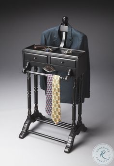 a suit and tie stand with a mannequin's necktie on it