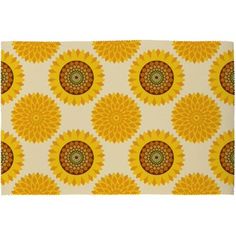 yellow sunflowers on white background with green and brown circles in the center,