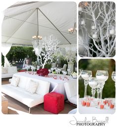 a white couch sitting under a tent next to wine glasses and candles on top of a table