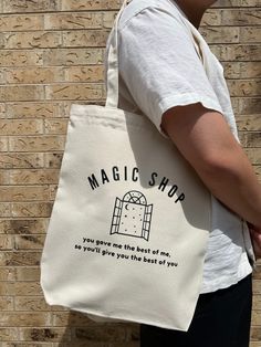 BTS inspired Magic Shop tote bag - Heavy Duty Recycled Cotton Canvas Tote Bags With Zipper and Inside Pocket - Bag measures 11.8" x 15.75" x 3.9" - Digital Design printed and heat transferred onto the fabric TOTE BAG CARE INSTRUCTIONS: -Do not machine wash -Hand spot clean ONLY Bts Tote Bag Design, Tote Bags With Zipper, Tote Bad, Bts Magic Shop, Fabric Tote Bag, Bts Things, Fabric Tote Bags