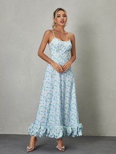 The Ilsa Spaghetti Floral Maxi Dress in Blue is a breathtaking display of beauty and charm. With its delicate spaghetti straps and vibrant floral pattern, it exudes a sense of feminine grace and elegance. The flowing maxi length adds an ethereal touch, making it an ideal choice for special occasions or summer soirées where effortless glamour is desired. Material: 100% Polyester Invisible zipper opening at the back Stretch Factor: Non Stretch Clean: Gentle machine wash Color may vary due to the l Spring Maxi Dress With Spaghetti Straps, Spring Vacation Maxi Dress With Delicate Straps, Flowy Maxi Dress With Spaghetti Straps For Garden Party, Light Blue Spring Dress With Adjustable Straps, Summer Maxi Dress With Delicate Straps, Feminine Spring Maxi Dress With Spaghetti Straps, Blue Maxi Dress With Adjustable Straps, Flowy Floral Print Maxi Dress With Spaghetti Straps, Spring Maxi Dress With Delicate Straps