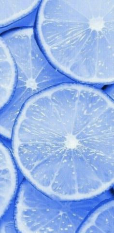 several slices of lemon are shown in blue