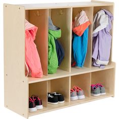 a wooden cubby with several pairs of shoes on it