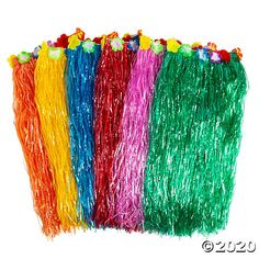 multicolored hula streamers are lined up in a row on a white background