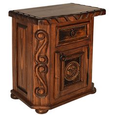 an ornate wooden cabinet with two drawers