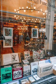 an open book store window with books on display