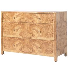 the chest of drawers is made out of wood and has four drawers on each side