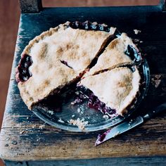 a pie sitting on top of a wooden table