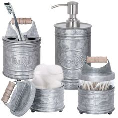 an assortment of bathroom accessories including soap dispenser and toothbrush holder