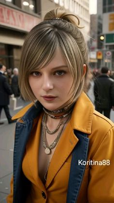 a woman with blonde hair wearing a yellow shirt and blue jacket standing on the street