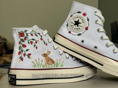 Hand-embroidered Converse shoes are all products that are carefully designed and stitched by artisans, shape your style, and give you unique beauty, bringing confidence and catching everyone's eye. Wearing hand-embroidered Converse shoes with a personal touch offers many benefits. Here are some of the key advantages: 👉Unique Style: Each pair of hand-embroidered Converse shoes is one-of-a-kind. Because they are crafted with care, no two pairs are exactly the same. This helps you stand out and sh Embroidered White Converse, Witchy Closet, Embroidered Converse High Tops, Embroidered Converse, Strawberry Flower, Embroidered Shoes, White Converse, Sneakers Athletic, Unique Beauty