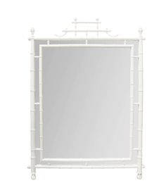 a white bamboo mirror on a white background