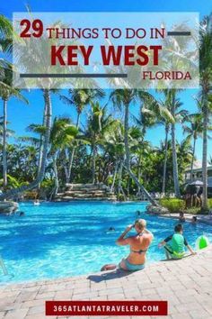 people sitting on the edge of a swimming pool with palm trees in the background and text overlay that reads 29 things to do in key west florida