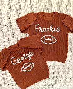 Looking for a unique and thoughtful gift for game day, a football themed birthday, milestone photos or another special occasion? This handmade FOOTBALL sweater is a charming and one-of-a-kind present that will be cherished for years to come. This oversized sweater is for babies, toddlers and children. You can add your personalization in the box at check out.  Sweater/yarn color: The sweater color for this particular listing is CARAMEL BROWN, with WHITE yarn for the embroidery. Looking for different colors? Just message me and we'll find the color you want. If you would prefer a sweater with name only (no football), please see our other baby name sweaters. The name of your choice is hand embroidered in WHITE on the front of the sweatshirt above the FOOTBALL graphic as seen in the photo. I c Game Day Crew Neck T-shirt With Letter Embroidery, Football Embroidered Sweatshirt, Hand Embroidery Name Sweater, Hand Embroidered Name Sweater, Baby Name Embroidery Sweater, Sweater With Name, Football Sweater, Gift Embroidery, Name Announcement