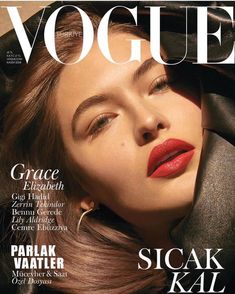 a woman with red lipstick on the cover of a magazine