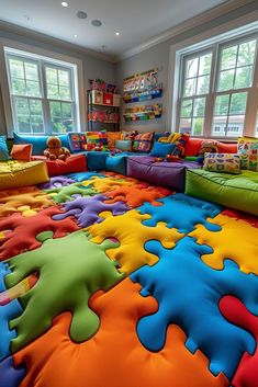 a colorful play room with lots of puzzle pieces on the floor