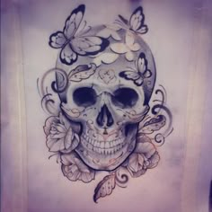 a drawing of a skull with flowers and butterflies on it's head is shown