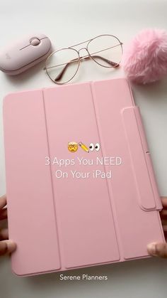 a pink ipad case sitting on top of a table next to a mouse and eyeglasses