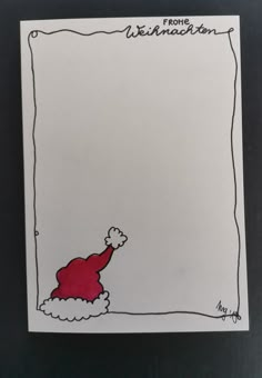 a paper with a santa hat on it