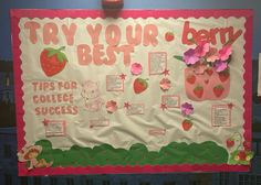 a bulletin board with flowers and strawberries on it