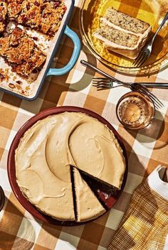 a table topped with lots of different types of food and desserts on top of it