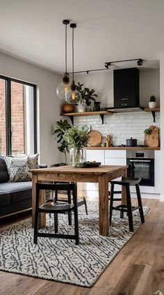 a living room filled with furniture and a wooden table