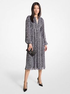 For daytime events, work functions and everything in between, this leopard-print dress is your closet’s secret weapon. It features a nipped-in waist accentuated by blouson sleeves and a gently pleated midi skirt. Wear it with heeled pumps and a clutch bag for a dressed-up look that reads polished. Elegant Leopard Print Midi Dress For Fall, Spring Leopard Print Knee-length Midi Dress, Leopard Print Spring Dresses For Work, Spring Leopard Print Work Dresses, Leopard Print Dress For Spring Workwear, Fall Leopard Print Midi Dress, Sunday Dresses, Heeled Pumps, Pleated Midi Dress