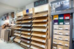 an assortment of wood flooring samples in a store