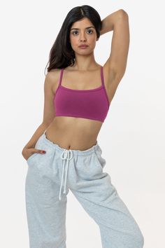 This basic, everyday bralette is made of our premium, heavyweight garment dyed cotton spandex and is designed to be the perfect crop top for days you would rather wear less. This Bralette features just the right amount of coverage that you can wear it as a crop top with sweats or with bike shorts and leggings for your daily errands and has endless, effortless styling opportunities. This style also pairs well underneath our mesh tops and is suitable for lounging, yoga, jogging and more. Features Shorts And Leggings, Los Angeles Apparel, La Outfits, Garment Manufacturing, Mesh Tops, Long Sleeve Kids, Black Bralette, Fleece Pants, Bike Shorts