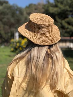 ✅I made this beautiful hat from natural paper rope. ✅The product has a standard size and the raffia rope material is flexible. ✅Handcrrafted in Turkey ✅Hand-crocheted with care 👒Straw hat, handmade and unique. For you if you want to look original and not similar to all others. ✅You can combine your clothes with a straw summer hat on summer days ✅Whether you keeping it to yourself or gifting someone you care, it will be unforgettable. ✅Foldable and easy to travel with. ✅This hat is light weight Brimmed Woven Toquilla Straw Bucket Hat, Natural Wide Brim Toquilla Straw Bucket Hat, Wide Brim Natural Woven Bucket Hat, Natural Woven Wide Brim Bucket Hat, Wide Brim Woven Bucket Hat In Natural, Casual Natural Braided Hat, Natural Straw Bucket Hat With Curved Brim, Natural Woven Bucket Hat With Short Brim, Casual Braided Toquilla Straw Boater Hat